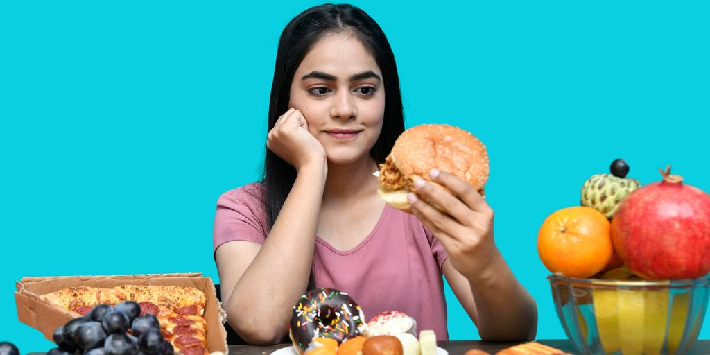 a woman eating a sandwich