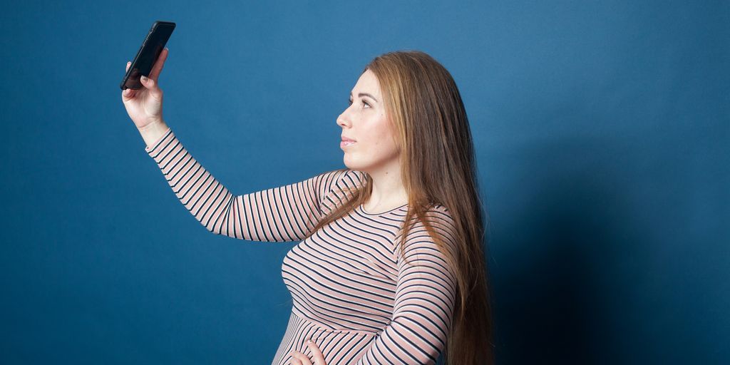 a woman holding a gun