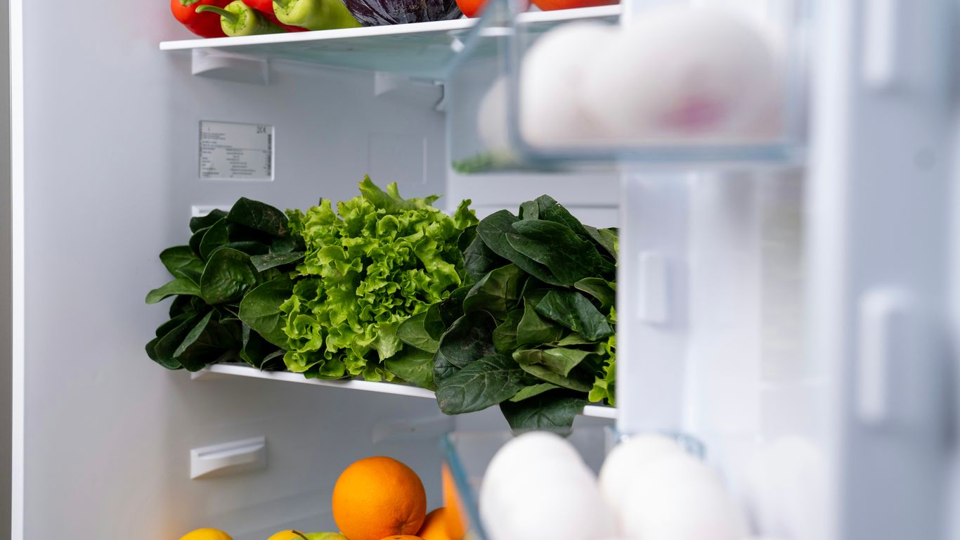 A refrigerator filled with lots of fresh fruits and vegetables