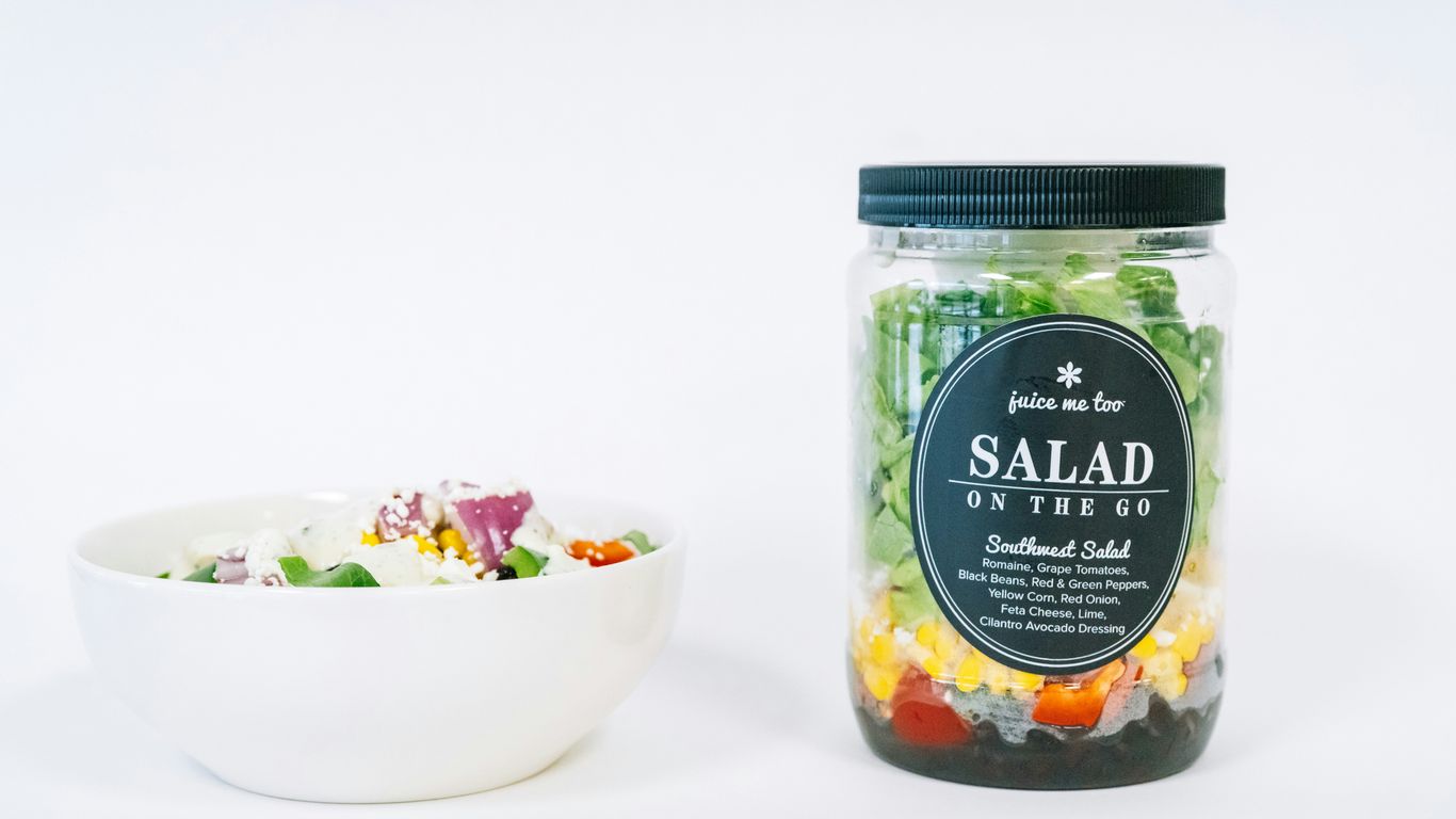 A salad-in-a-jar and a bowl of salad.