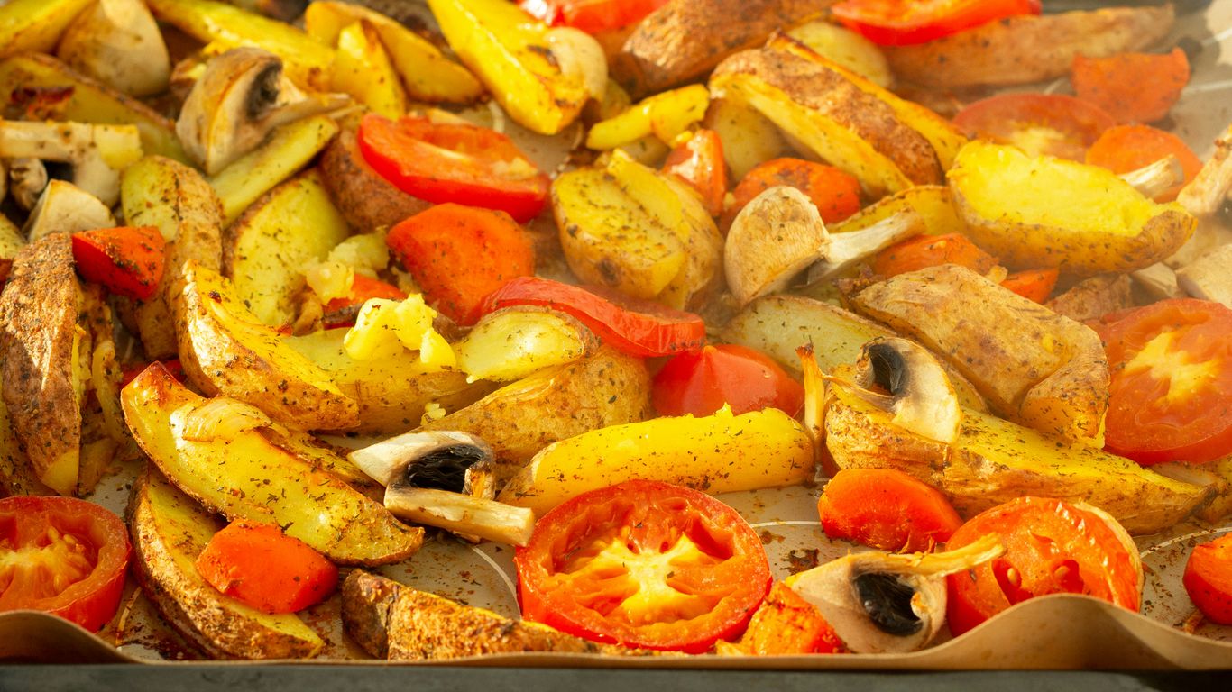sliced orange fruit on stainless steel tray