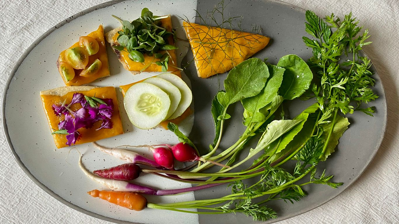 sliced cucumber and tomato on white ceramic plate