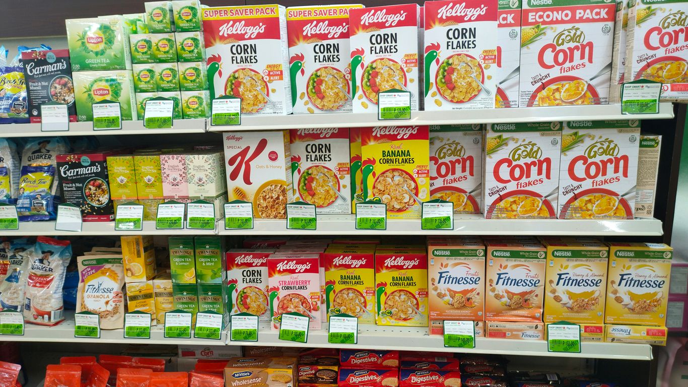 a grocery store shelf filled with lots of food