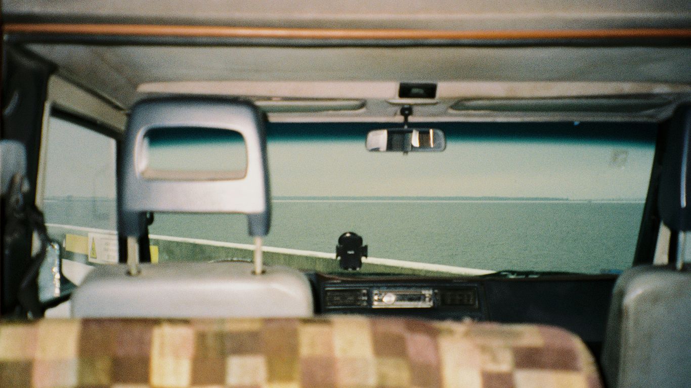 a view of the back of a vehicle from inside the vehicle