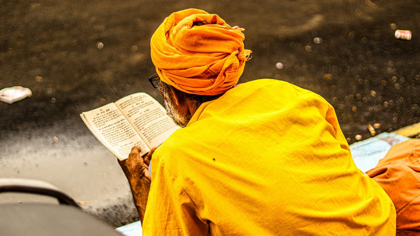 a person reading a newspaper