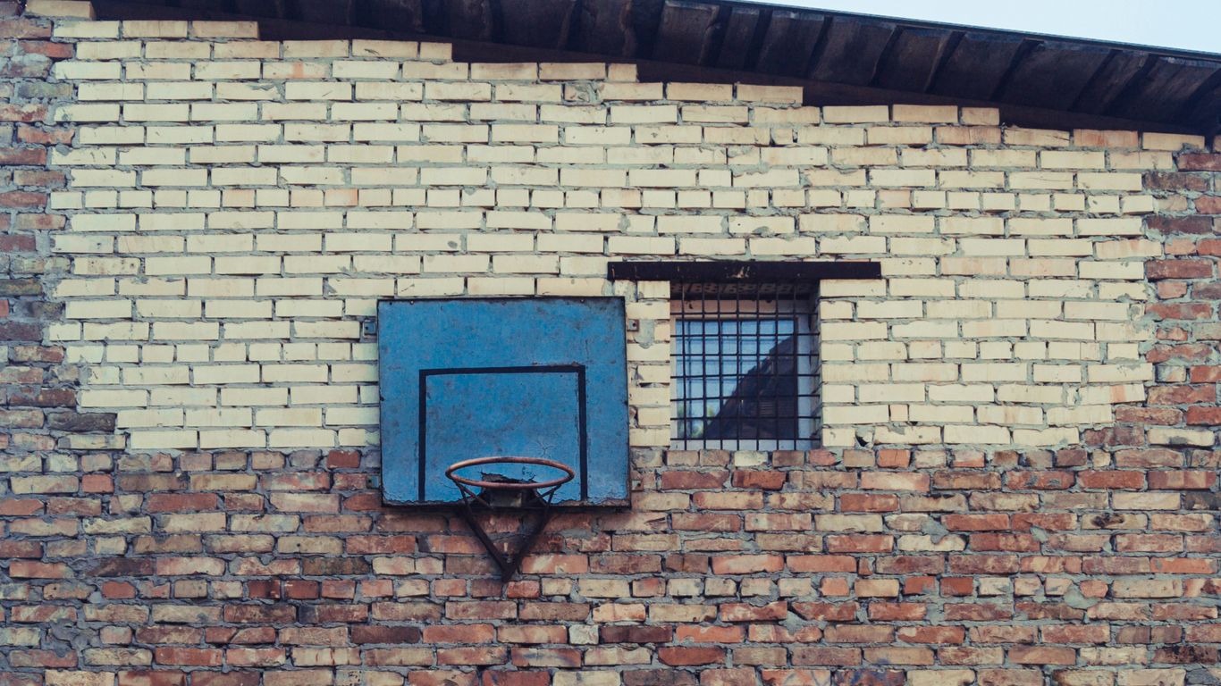 a brick wall with windows